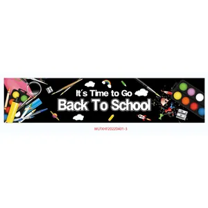 Detailed flat lay of black Back to School banner with school supplies and rainbow motifs