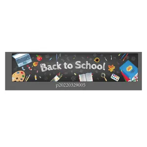Detail of Back to School banner with school supplies on dark blackboard background