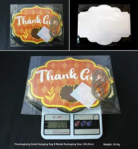 Detail view of Thanksgiving tags with hemp rope and stickers in clear packaging