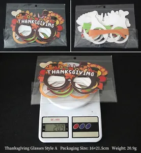 Detail view of Thanksgiving party paper glasses in packaging showing weight and dimensions