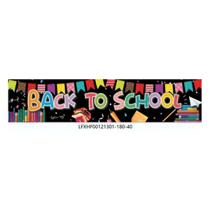 Close-up of Back to School banner with colorful text, school supplies, and black background