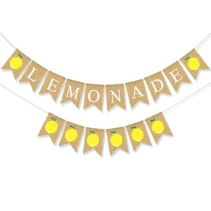 Detail of burlap banner with LEMONADE letters and yellow lemon print for celebrations
