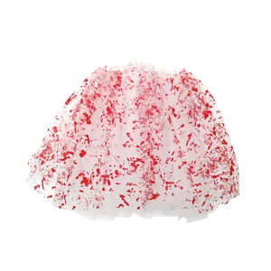 Detailed macro view of white tutu mesh layers with realistic red blood splatter effects