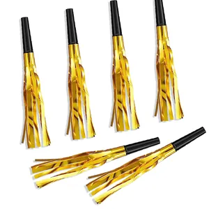 Detail of six gold fringed party blowers with black mouthpieces for celebrations