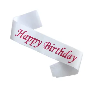 White satin Happy Birthday sash with bright pink cursive lettering for party decor