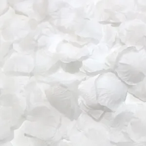 Close-up of white artificial rose petals with realistic woven texture for weddings