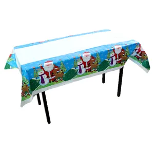 Detail van het wegwerpbare PE kersttafelkleed met patronen van de kerstman en sneeuwpop