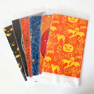 Halloween disposable table covers with pumpkin skulls and spider web patterns for party decor