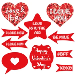 Detailed view of 10-piece Valentine's Day photo props with red hearts and festive slogans