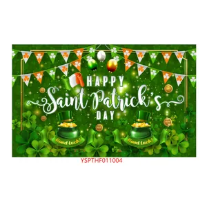 Detailed close-up of St. Patrick's Day polyester backdrop with shamrock and gold coin prints