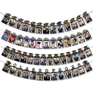 Close-up of Class of 2026 graduation photo banner with black cardstock frame cards
