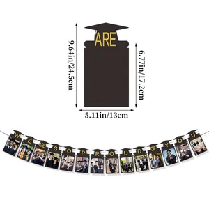 Detail view of graduation photo banner with black cap design and size dimensions
