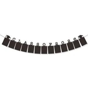Detail of Class of 2026 graduation photo banner with black cards and graduation cap accents