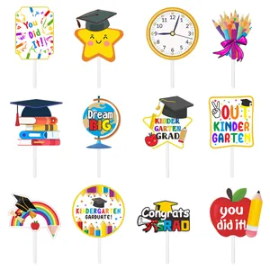 Detailed set of 12 graduation photo props featuring colorful paper cards and hand-held sticks