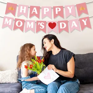 Pink Happy Mom's Day banner flag hanging in a warm home scene with mother and daughter