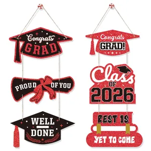 Detail of glitter 2026 graduation banner set with congrats grad and tassel accents