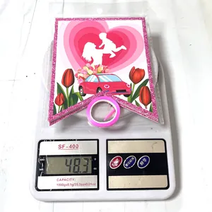 Weight measurement of Mother's Day Best Mom Ever heart banner with pink ribbon