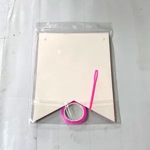 DIY Mother's Day bunting set with cream flags and pink ribbon in clear packaging
