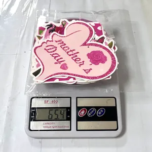 Weight measurement of the Mother's Day sticker set heart designs on a digital scale