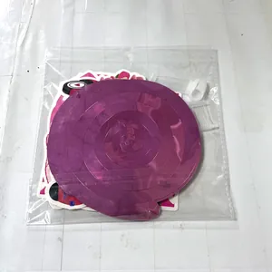Detail of purple spiral ceiling hangers and theme cards in clear plastic packaging
