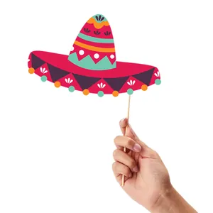 Macro view of a colorful Mexican Sombrero photo prop with intricate patterns on a hand stick