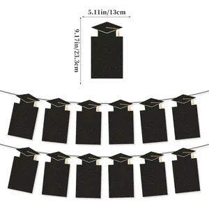 2026 graduation photo banner with black glitter cap cards and gold tassels for party décor