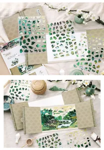 Detailed view of Chinese landscape puzzle stickers on a scroll with traditional scenery