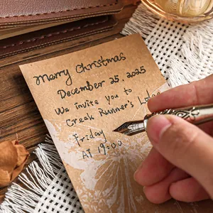 Vintage metal fountain pen with ornate floral carvings on a retro notebook background