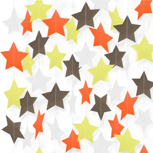Star and circle paper garland banner in orange, yellow and brown for festive party decor