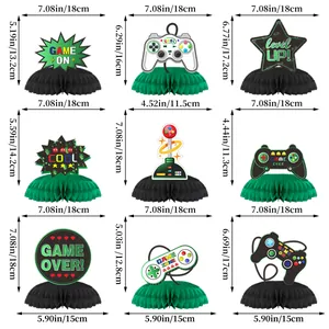 Set of 9 video game party honeycomb centerpieces featuring gamepads and pixel art designs