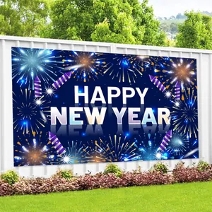 Festive Happy New Year outdoor banner with fireworks on a white garden fence