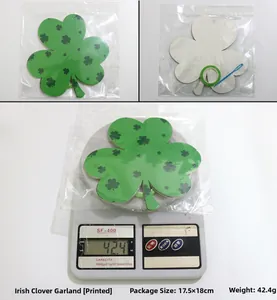 Detail of St. Patrick's Day clover banner showing green cardstock, ribbon and packaging size