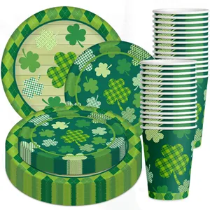 Detail of St. Patrick's Day paper plates and cups featuring green shamrock clover patterns