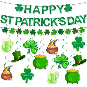 Macro view of St. Patrick's Day decorations featuring green shamrocks and gold coin pots