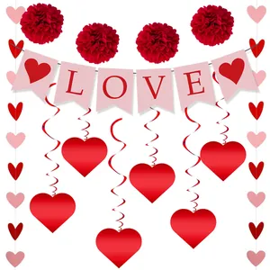 Detail view of Valentine wedding decoration set with LOVE banner and red heart pendants