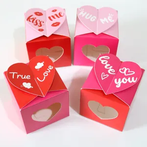 Set of four heart-shaped candy gift boxes with hollow windows for Valentine's Day