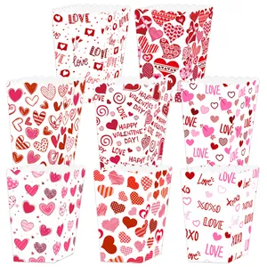 Set of eight Valentine's Day popcorn boxes with red hearts and Cupid designs for party snacks