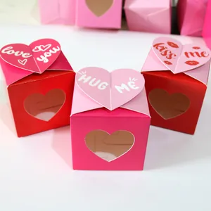Close-up of heart-shaped hollow window and fold-lock lid on romantic candy gift boxes