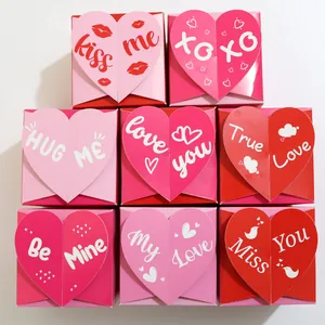 Detail of square candy gift boxes with heart-shaped card lids in vibrant assorted colors