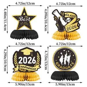 2026 graduation party table decor set with gold honeycomb bases and star shaped toppers
