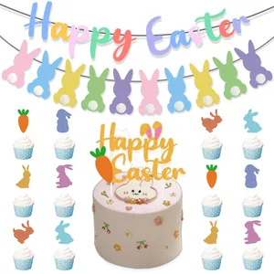 Detail of Happy Easter banner and glitter cake toppers with bunny and carrot designs