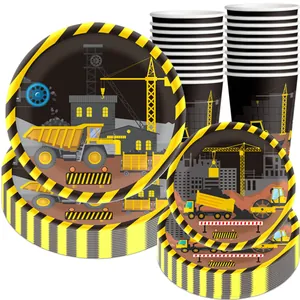 Detail of construction party tableware set with excavator prints on paper plates and cups