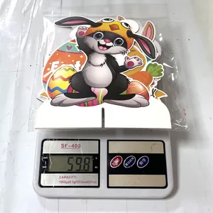 Weight measurement of 4-piece Easter rabbit honeycomb ornaments showing 59.8 grams