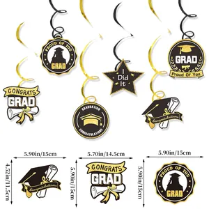 Black and gold graduation party hanging swirls with stars, hats and diplomas