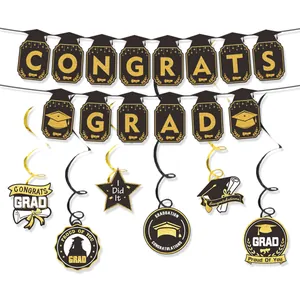 2026 Congrats Grad party decor set with black and gold banners and hanging swirls