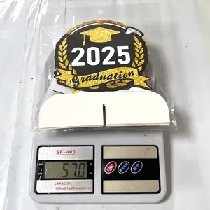 Detail view of 2025 Graduation decorations pack weighing 57g on a digital scale