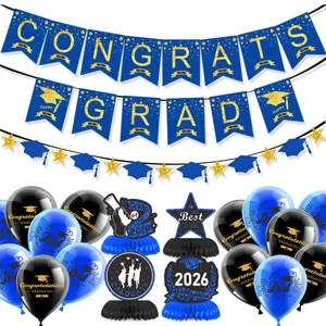 Detail view of 2026 graduation party kit with Congrats Grad banners and honeycomb centerpieces