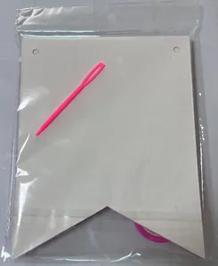 DIY pet birthday banner kit with white swallowtail cards and a pink threading needle
