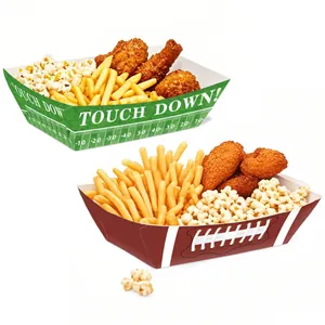 Detail view of football themed paper snack trays with popcorn and fried chicken