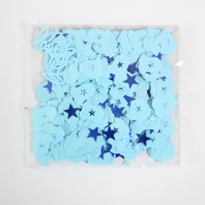 Blue baby shower confetti set with boy text and star shapes in transparent packaging